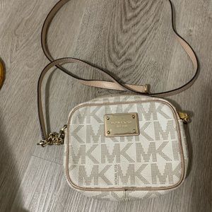 Tiny over the shoulder purse.